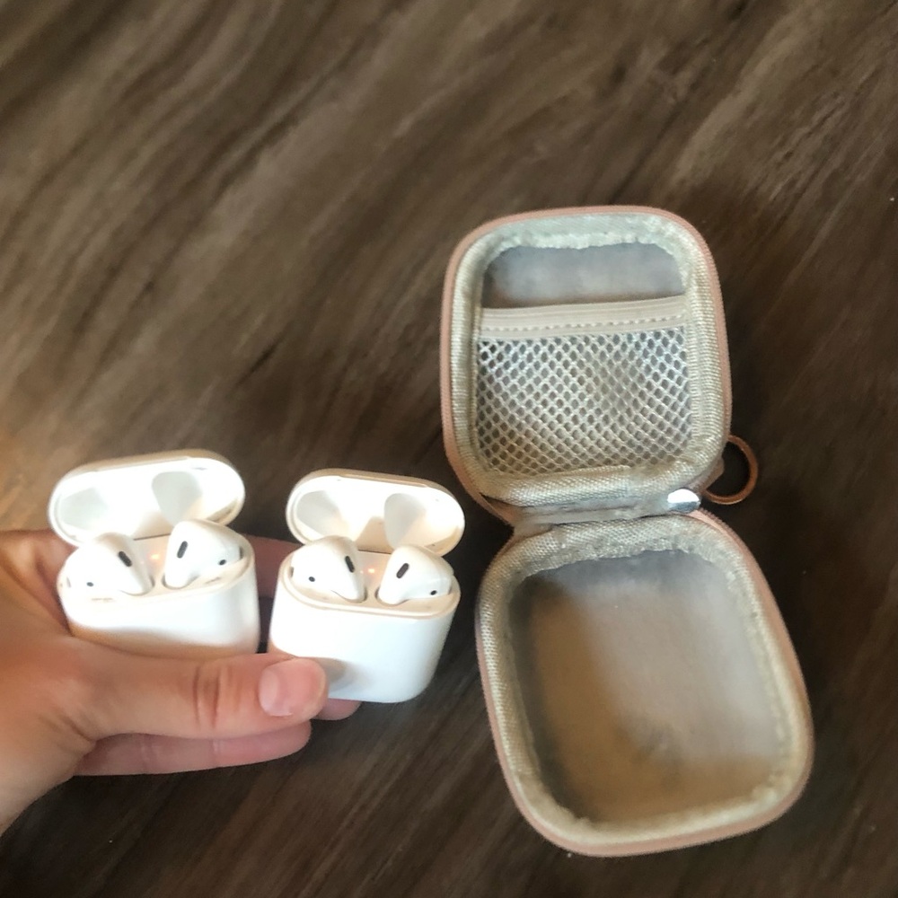 2 Sets of AirPods and a Case